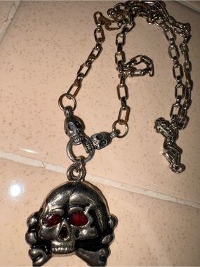 Silver Skull Pendant Necklace with Red Eyes